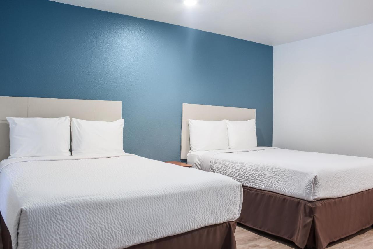 Woodspring Suites Conroe Exterior foto