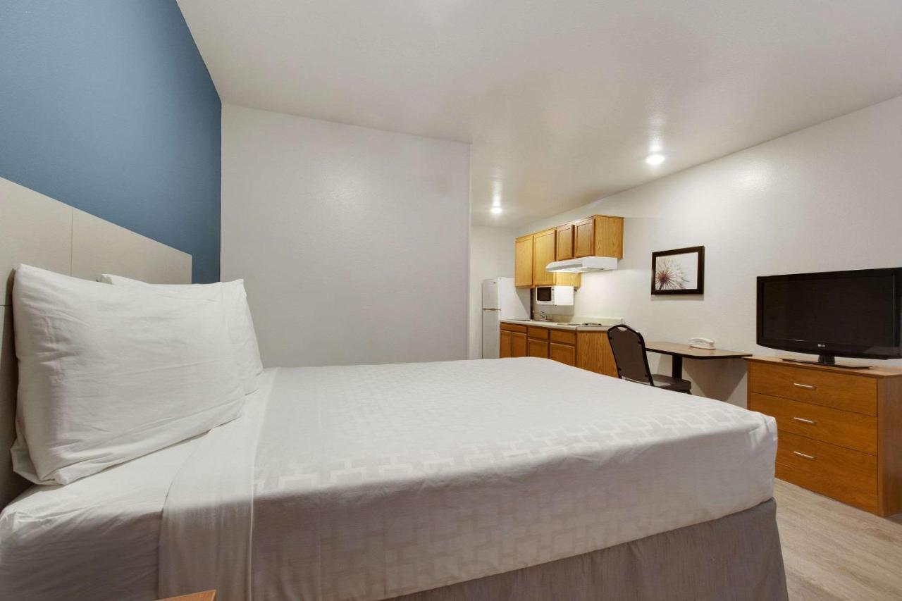 Woodspring Suites Conroe Exterior foto