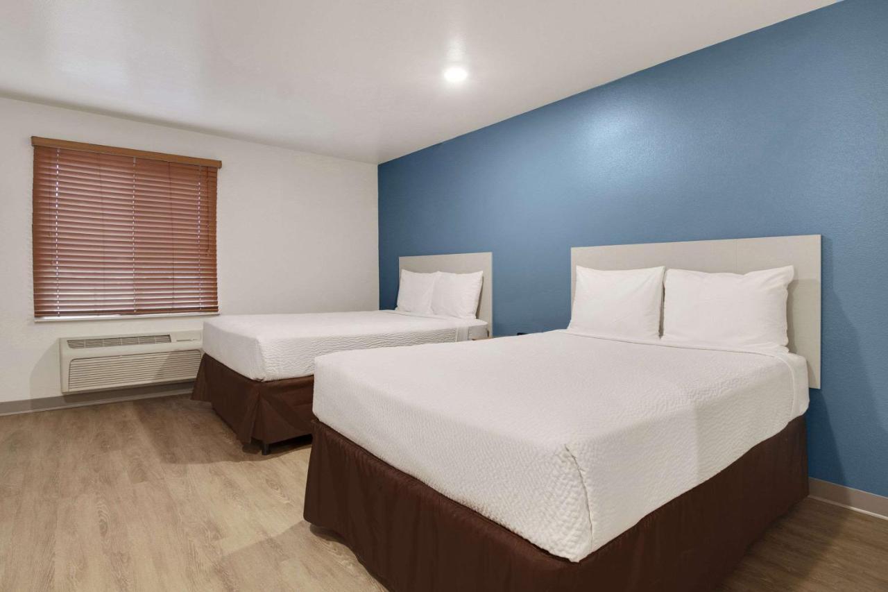Woodspring Suites Conroe Exterior foto