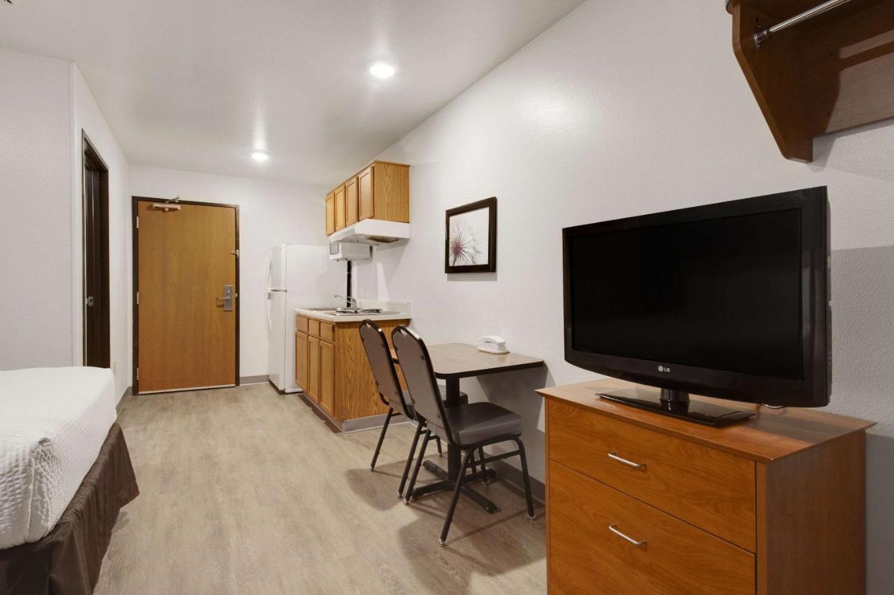 Woodspring Suites Conroe Exterior foto