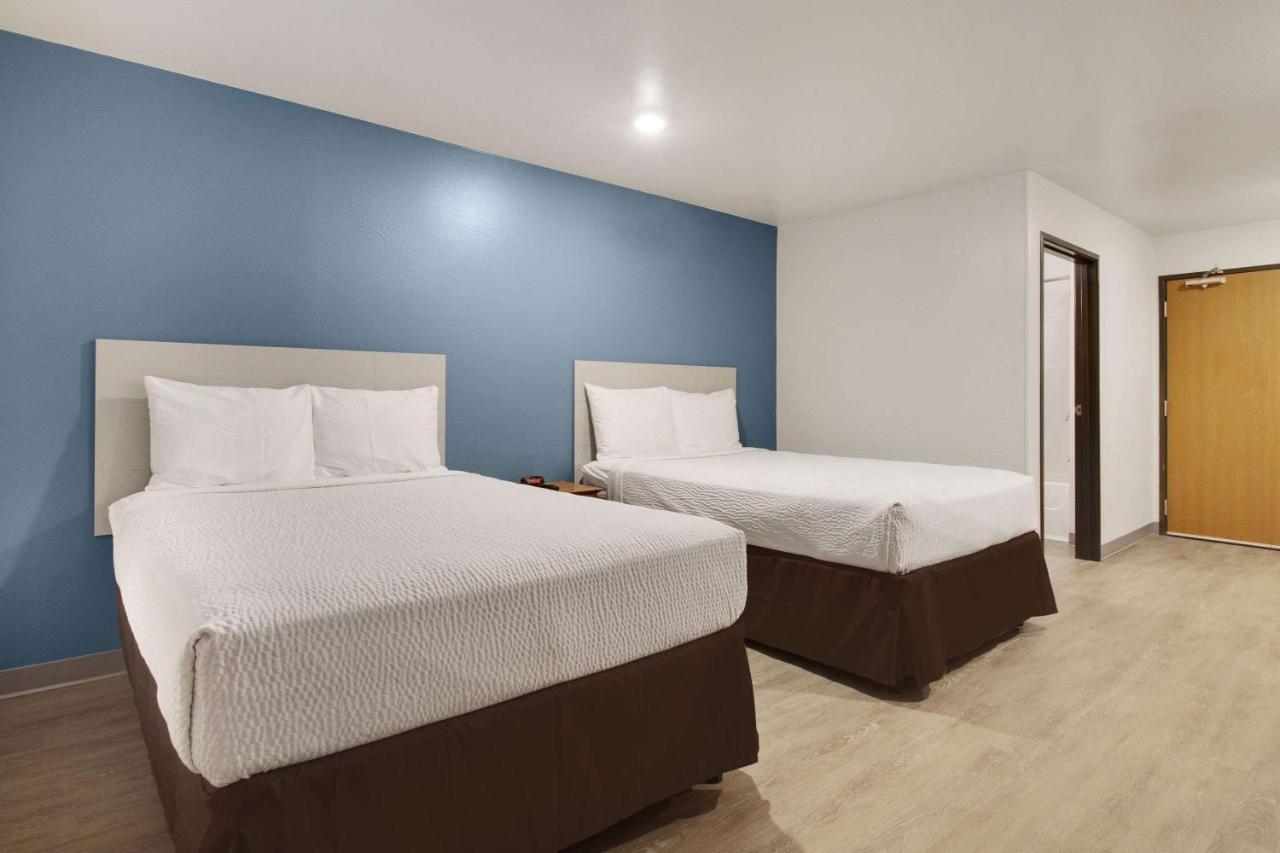 Woodspring Suites Conroe Exterior foto